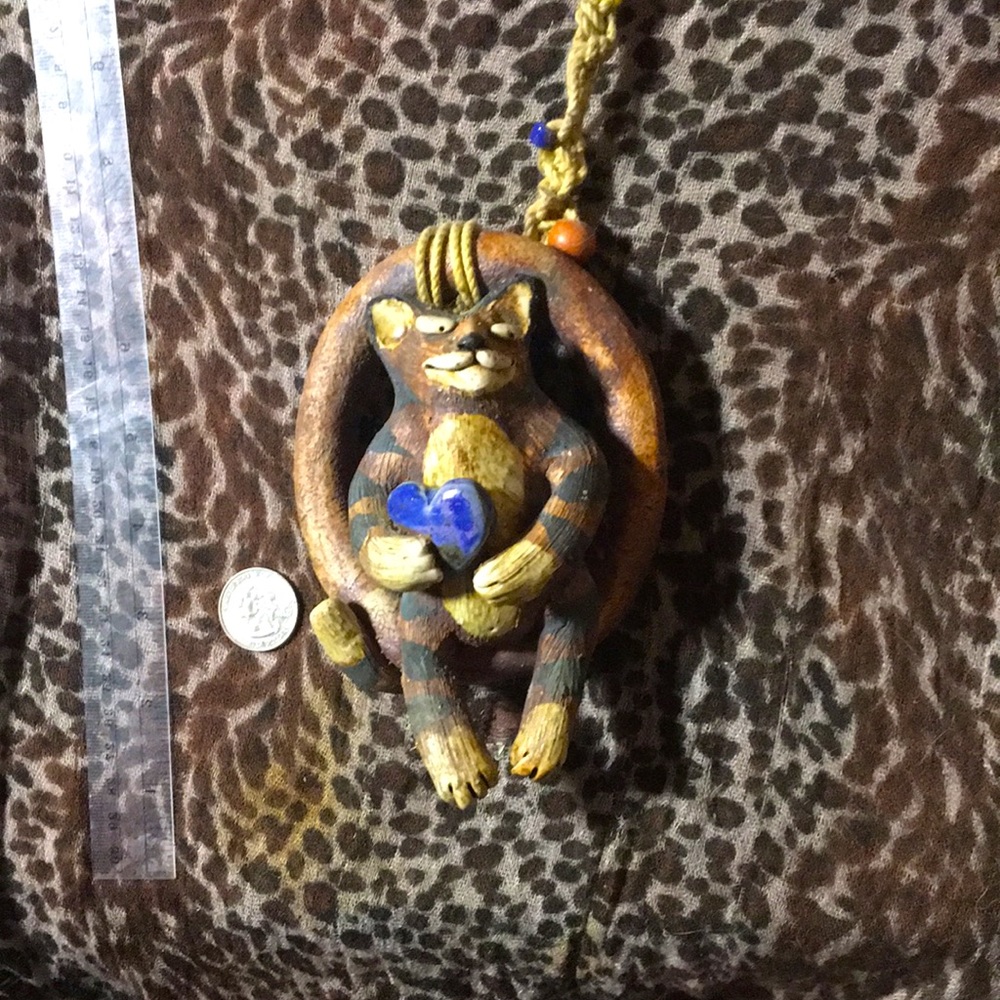 Vintage Wild earth swing’n cat sculpture